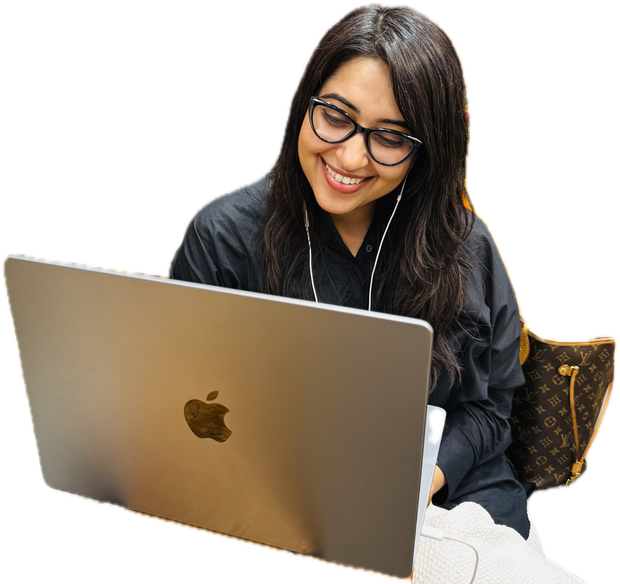 Geetika Khurana working on her laptop